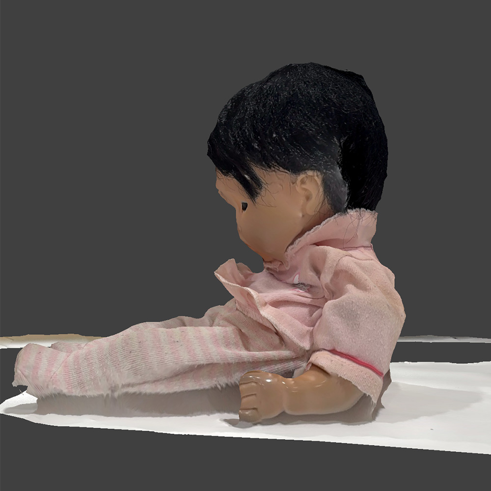 It was difficult to properly scan all features of the doll's face.